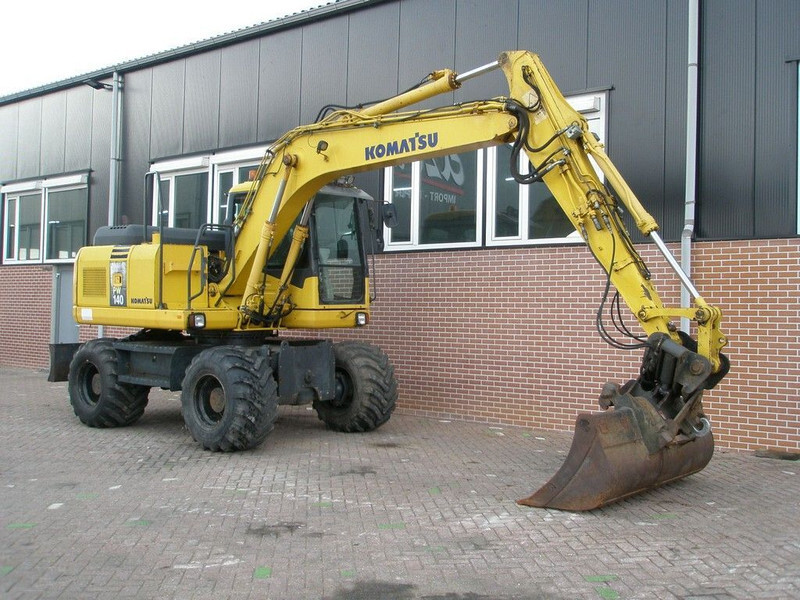 Komatsu PW140-7 - Τροχοφόρος εκσκαφέας: φωτογραφία 3 Komatsu PW140-7 - Τροχοφόρος εκσκαφέας: φωτογραφία 3