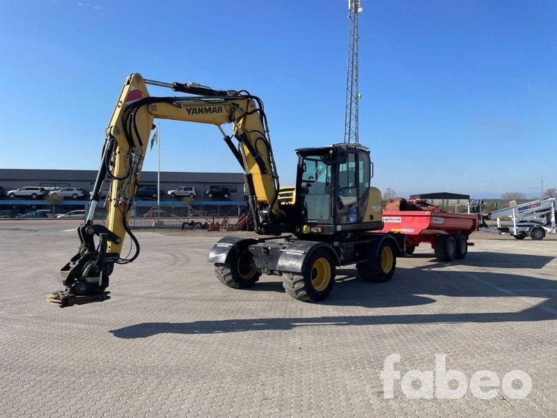 Yanmar B110W - Τροχοφόρος εκσκαφέας: φωτογραφία 1 Yanmar B110W - Τροχοφόρος εκσκαφέας: φωτογραφία 1