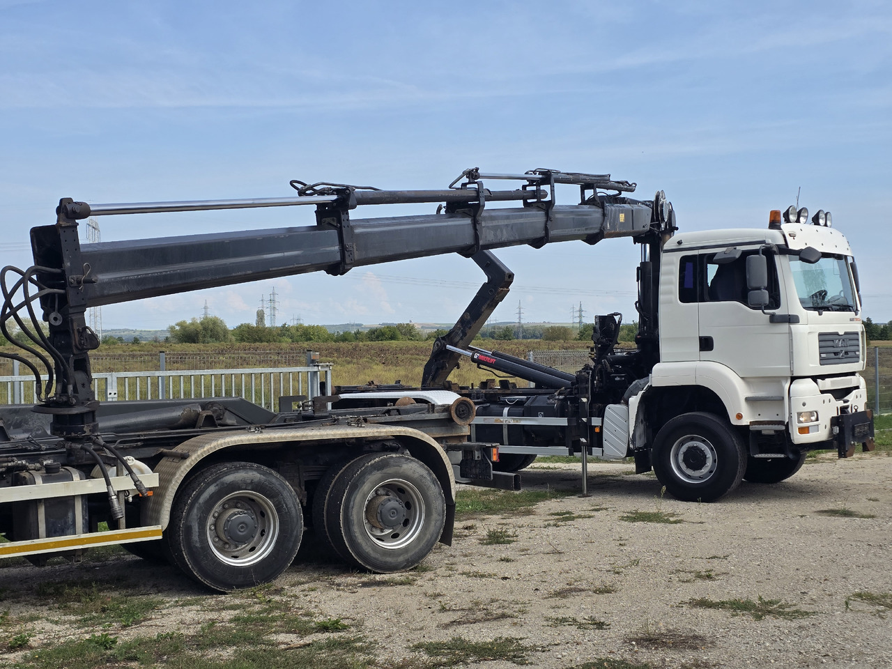 MAN TGA 26.440 6X6 / HOOK SYSTEM / HIAB 166D REMOTE SPECIAL PRICE ONLY THIS YEAR - Φορτηγό φόρτωσης γάντζου, Φορτηγό με γερανό: φωτογραφία 4 MAN TGA 26.440 6X6 / HOOK SYSTEM / HIAB 166D REMOTE SPECIAL PRICE ONLY THIS YEAR - Φορτηγό φόρτωσης γάντζου, Φορτηγό με γερανό: φωτογραφία 4
