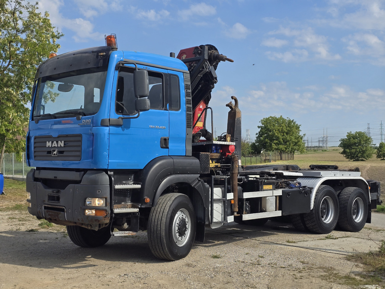 MAN TGA 33.430 6X6 / HMF 1823 K3+REM.CON./ HOOK SYSTEM 2x in stock - Φορτηγό φόρτωσης γάντζου, Φορτηγό με γερανό: φωτογραφία 3 MAN TGA 33.430 6X6 / HMF 1823 K3+REM.CON./ HOOK SYSTEM 2x in stock - Φορτηγό φόρτωσης γάντζου, Φορτηγό με γερανό: φωτογραφία 3