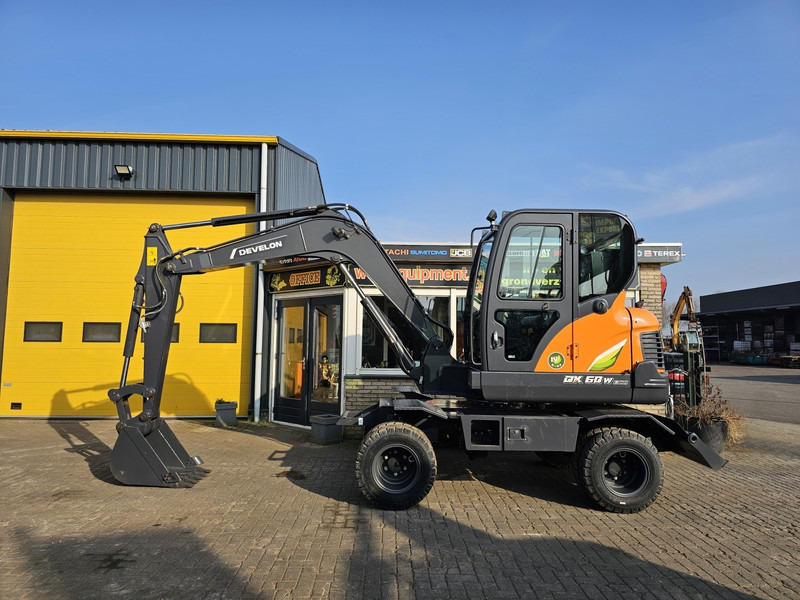 Develon DX60WN ECO-1 - Τροχοφόρος εκσκαφέας: φωτογραφία 1 Develon DX60WN ECO-1 - Τροχοφόρος εκσκαφέας: φωτογραφία 1