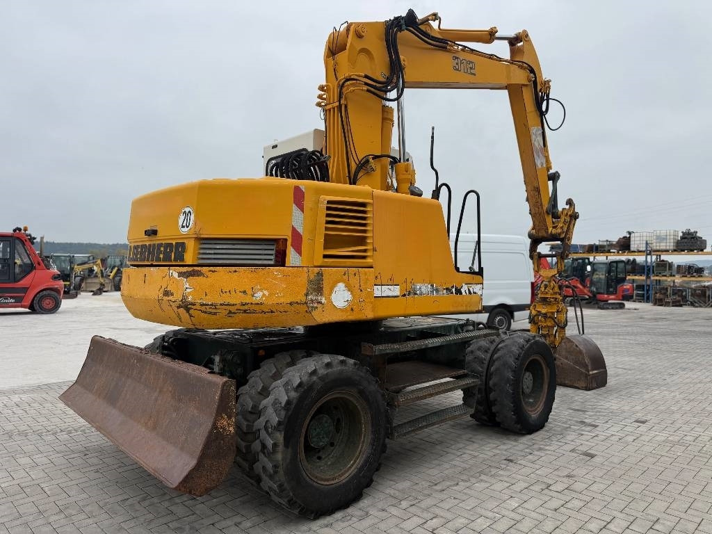 Liebherr A 312 - Τροχοφόρος εκσκαφέας: φωτογραφία 5 Liebherr A 312 - Τροχοφόρος εκσκαφέας: φωτογραφία 5