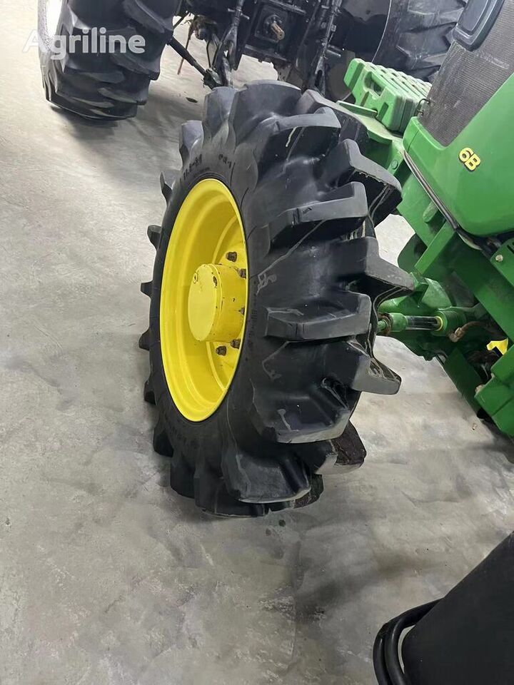 John Deere 1404 - Τρακτέρ: φωτογραφία 2 John Deere 1404 - Τρακτέρ: φωτογραφία 2