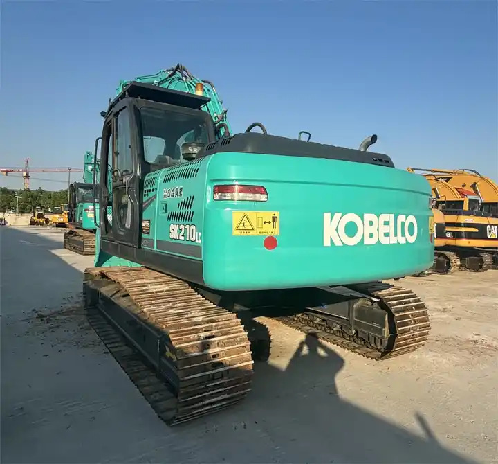 Japan Surplus Construction Excavator Kobelco Sk210 Sk230 Crawler Excavator With Hammer Pipe In Shanghai - Ερπυστριοφόρος εκσκαφέας: φωτογραφία 2 Japan Surplus Construction Excavator Kobelco Sk210 Sk230 Crawler Excavator With Hammer Pipe In Shanghai - Ερπυστριοφόρος εκσκαφέας: φωτογραφία 2