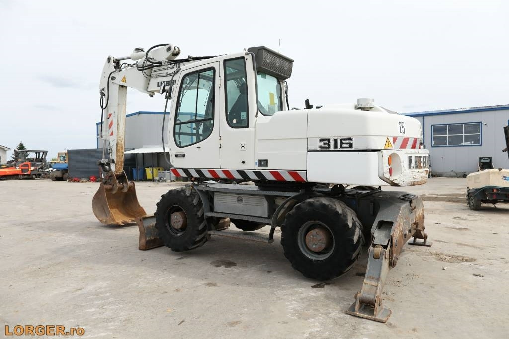 Liebherr A 316 Litronic - Τροχοφόρος εκσκαφέας: φωτογραφία 3 Liebherr A 316 Litronic - Τροχοφόρος εκσκαφέας: φωτογραφία 3