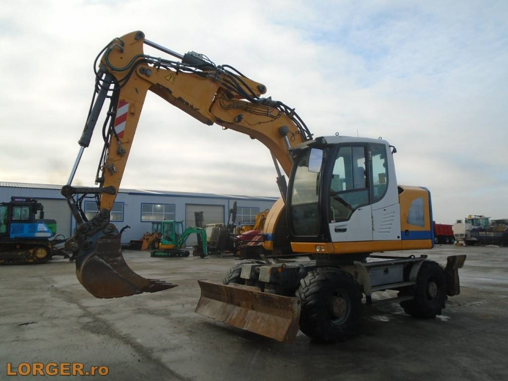 Liebherr A 914 Compact - Τροχοφόρος εκσκαφέας: φωτογραφία 1 Liebherr A 914 Compact - Τροχοφόρος εκσκαφέας: φωτογραφία 1