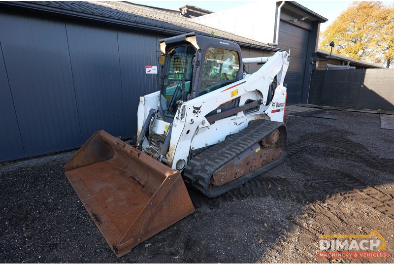 Bobcat T870 Bobcat T870 skidsteer on tracks - high flow - airco - high flow - TOP!! - Φορτωτής: φωτογραφία 3 Bobcat T870 Bobcat T870 skidsteer on tracks - high flow - airco - high flow - TOP!! - Φορτωτής: φωτογραφία 3