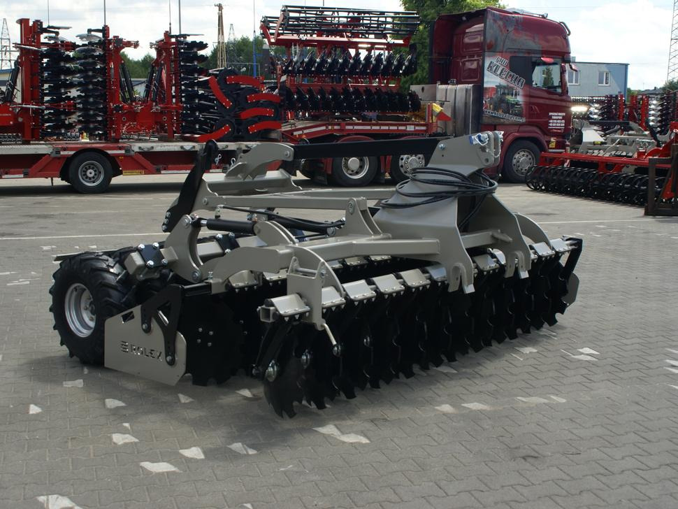 ROLEX Scheibenegge / Disc harrow with hydropack and tire roller / Dechaumeur à disques / Erpice a dischi / Дисковая борона с гидропаком и колёсным катком / Agregat talerzowy uprawowy z hydropackiem i - Δισκοσβάρνα: φωτογραφία 5 ROLEX Scheibenegge / Disc harrow with hydropack and tire roller / Dechaumeur à disques / Erpice a dischi / Дисковая борона с гидропаком и колёсным катком / Agregat talerzowy uprawowy z hydropackiem i - Δισκοσβάρνα: φωτογραφία 5