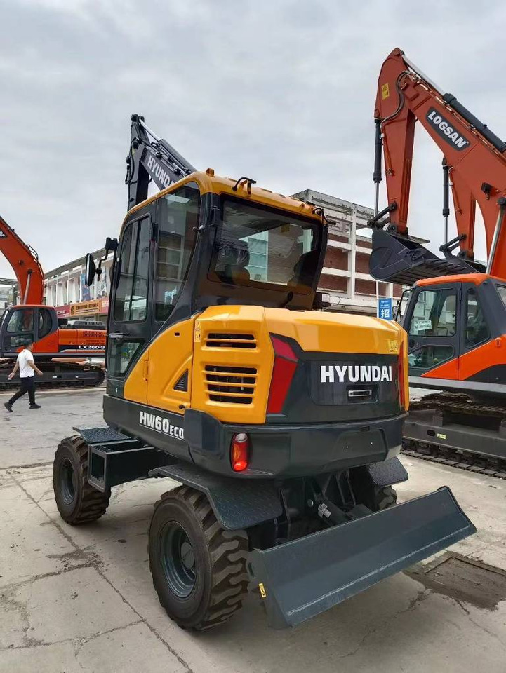 Hyundai 100% new Hyundai HW60ECO - Τροχοφόρος εκσκαφέας: φωτογραφία 1 Hyundai 100% new Hyundai HW60ECO - Τροχοφόρος εκσκαφέας: φωτογραφία 1