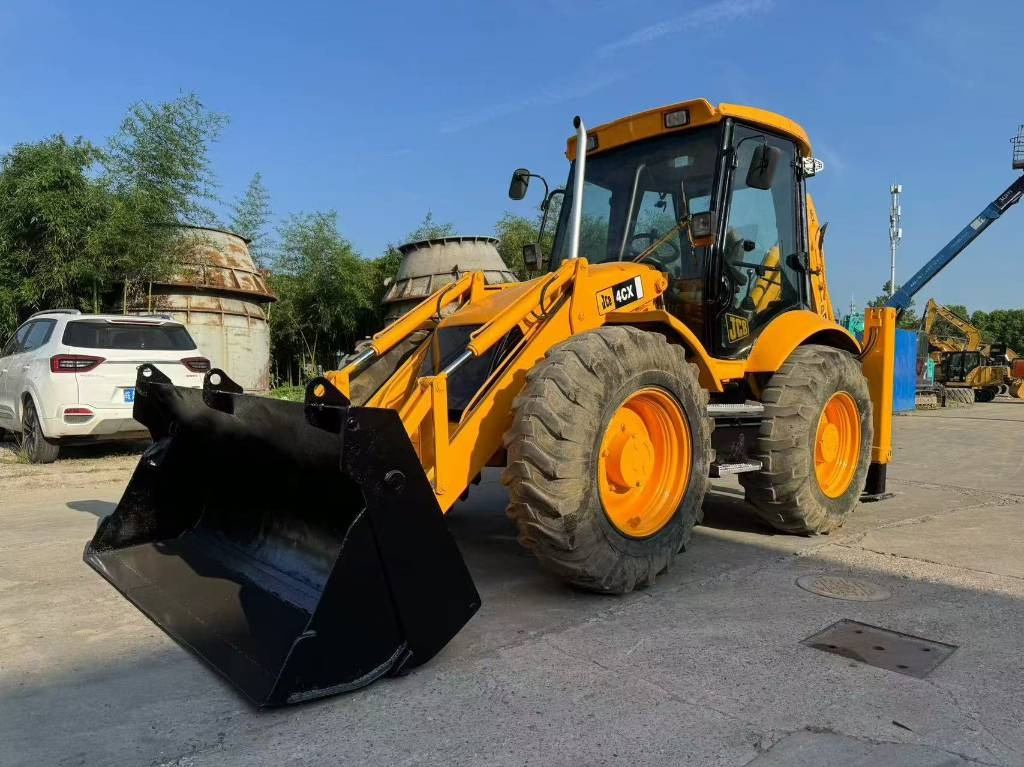JCB 4 CX - Φορτωτής εκσκαφέας: φωτογραφία 1 JCB 4 CX - Φορτωτής εκσκαφέας: φωτογραφία 1