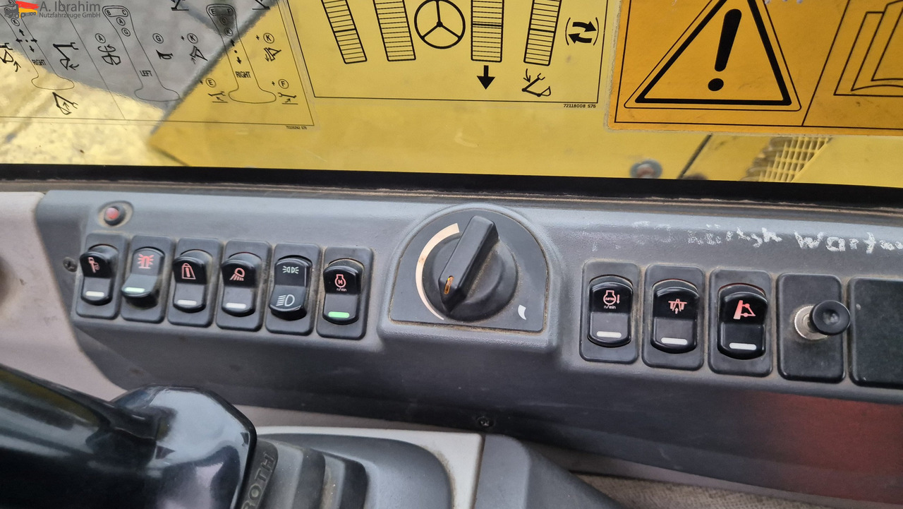 New Holland MH 2.6 Zustand gut, deutsche Maschine incl. Greifer und Dreservo - Τροχοφόρος εκσκαφέας: φωτογραφία 2 New Holland MH 2.6 Zustand gut, deutsche Maschine incl. Greifer und Dreservo - Τροχοφόρος εκσκαφέας: φωτογραφία 2