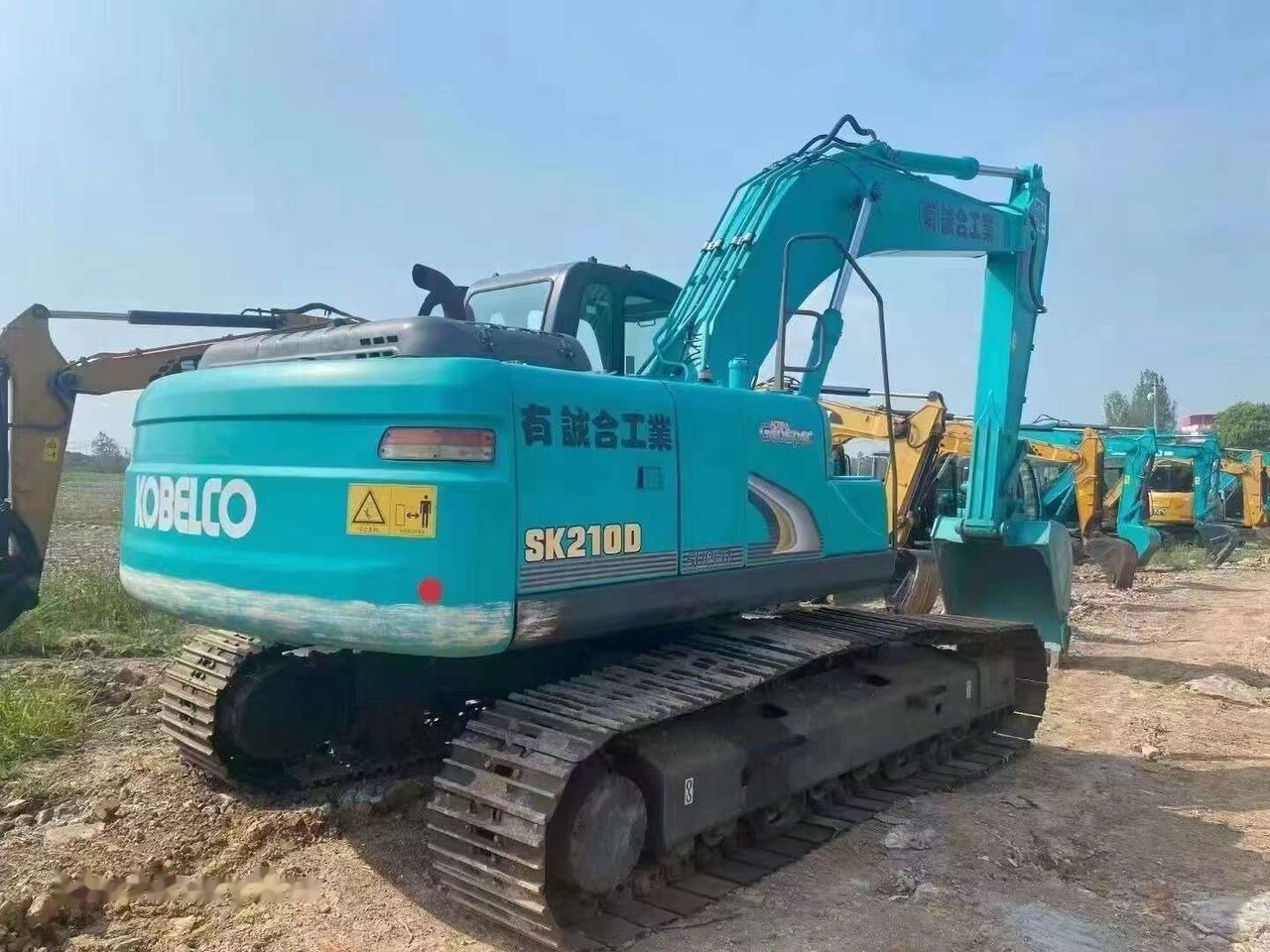 Kobelco SK210D - Ερπυστριοφόρος εκσκαφέας: φωτογραφία 2 Kobelco SK210D - Ερπυστριοφόρος εκσκαφέας: φωτογραφία 2