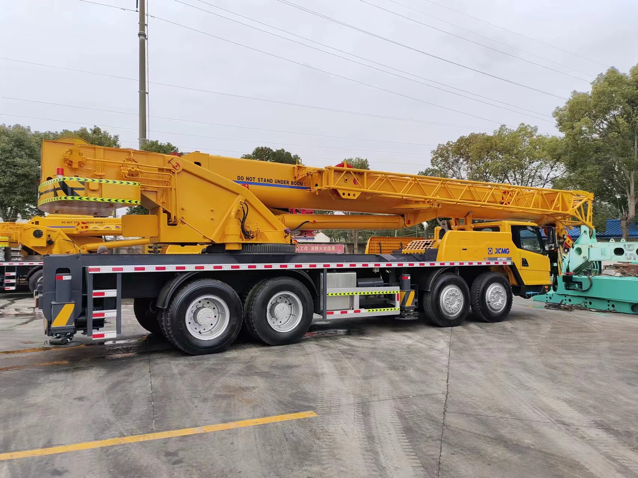 XCMG QY75K - Τηλεσκοπικός γερανός: φωτογραφία 1 XCMG QY75K - Τηλεσκοπικός γερανός: φωτογραφία 1