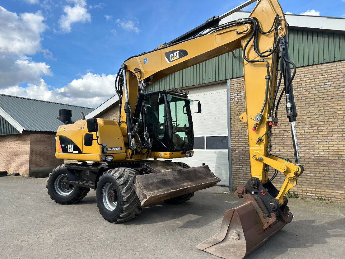 Τροχοφόρος εκσκαφέας Caterpillar M313D: φωτογραφία 7