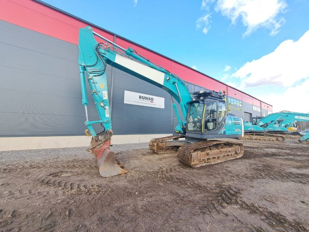 Kobelco SK 210 LC-10E - Ερπυστριοφόρος εκσκαφέας: φωτογραφία 1 Kobelco SK 210 LC-10E - Ερπυστριοφόρος εκσκαφέας: φωτογραφία 1
