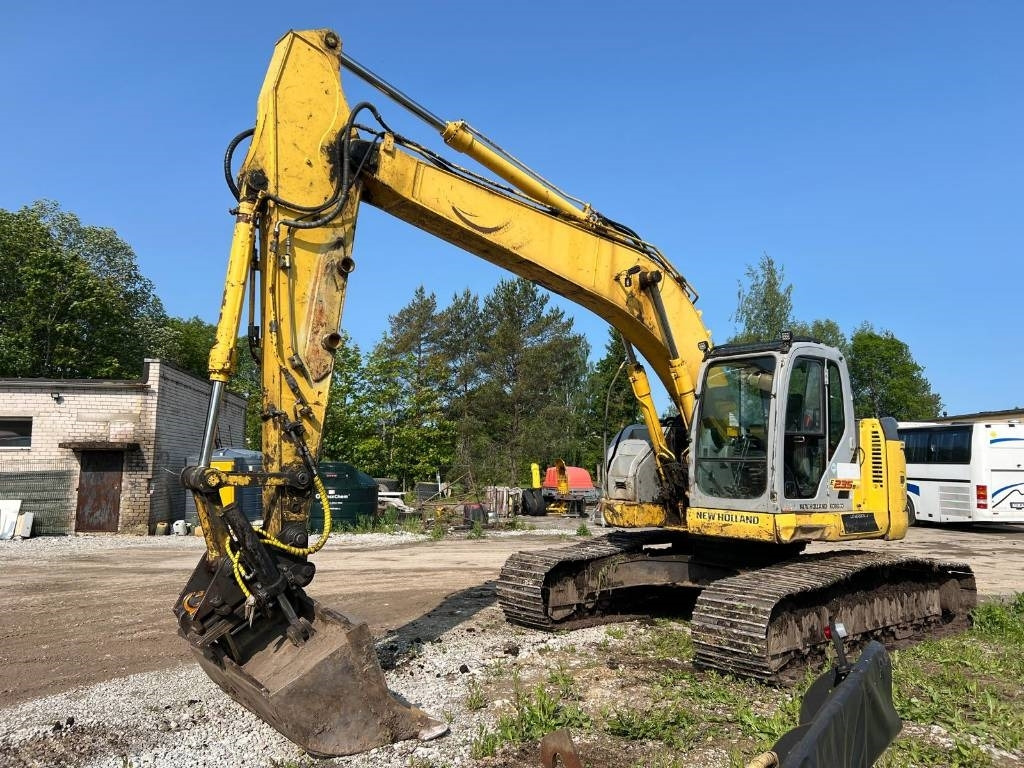 NEW HOLLAND KOBELCO E235BSRLC-2 - Ερπυστριοφόρος εκσκαφέας: φωτογραφία 1 NEW HOLLAND KOBELCO E235BSRLC-2 - Ερπυστριοφόρος εκσκαφέας: φωτογραφία 1
