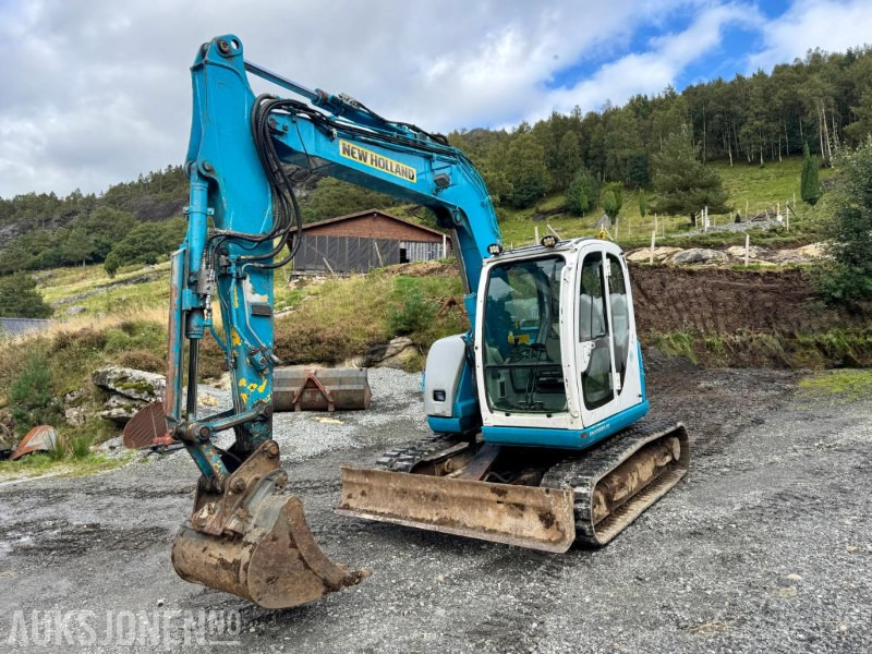 2008 New Holland E70SR-ES Gravemaskin - Tannskuffe - Grøfteskuffe - Pusseskuffe - Timer: 5746 - Μίνι εκσκαφέας: φωτογραφία 1 2008 New Holland E70SR-ES Gravemaskin - Tannskuffe - Grøfteskuffe - Pusseskuffe - Timer: 5746 - Μίνι εκσκαφέας: φωτογραφία 1
