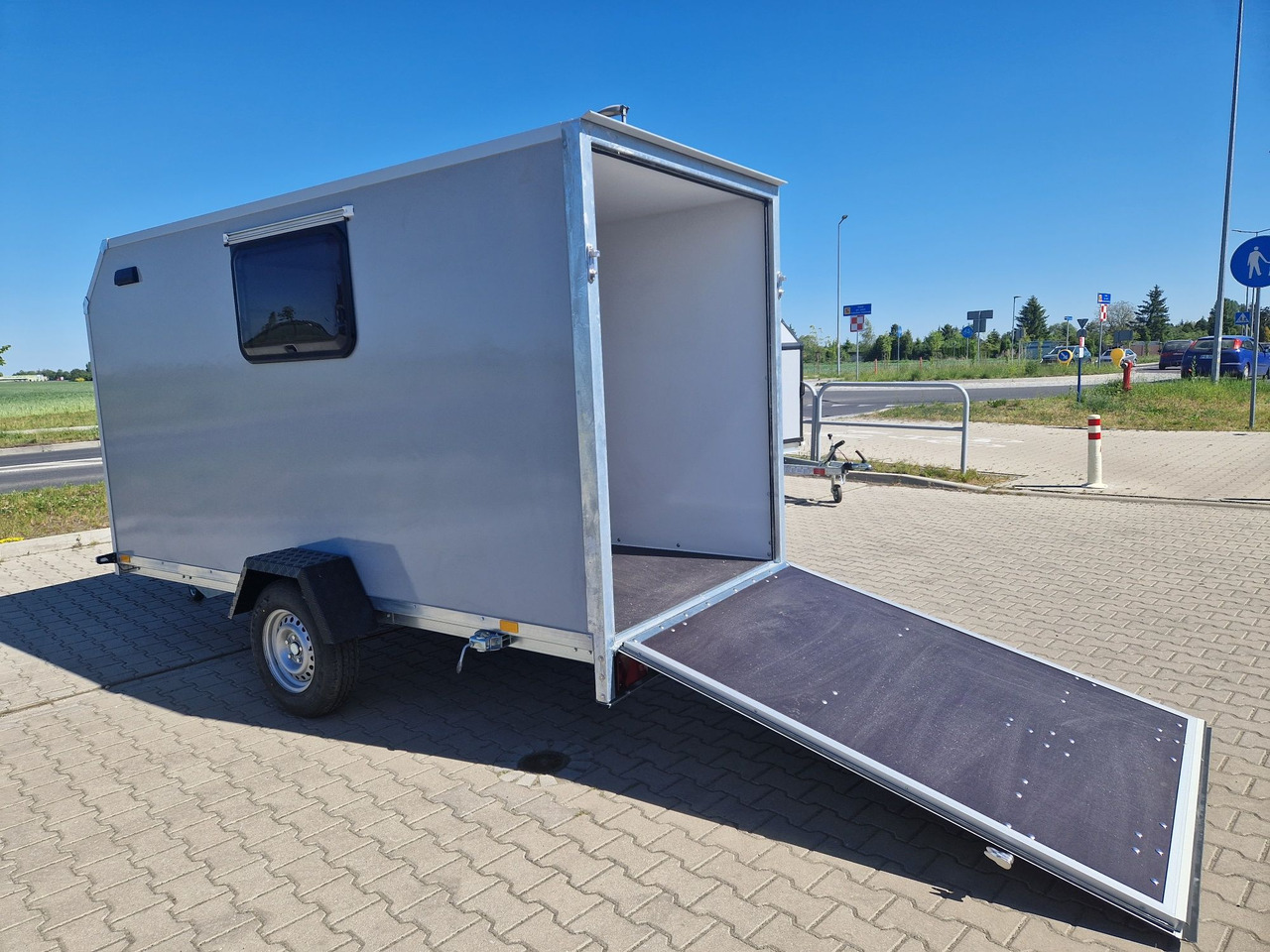 Przyczepa kempingowa Motocamp dla motocykla - Ρυμουλκούμενο τροχόσπιτο: φωτογραφία 1 Przyczepa kempingowa Motocamp dla motocykla - Ρυμουλκούμενο τροχόσπιτο: φωτογραφία 1