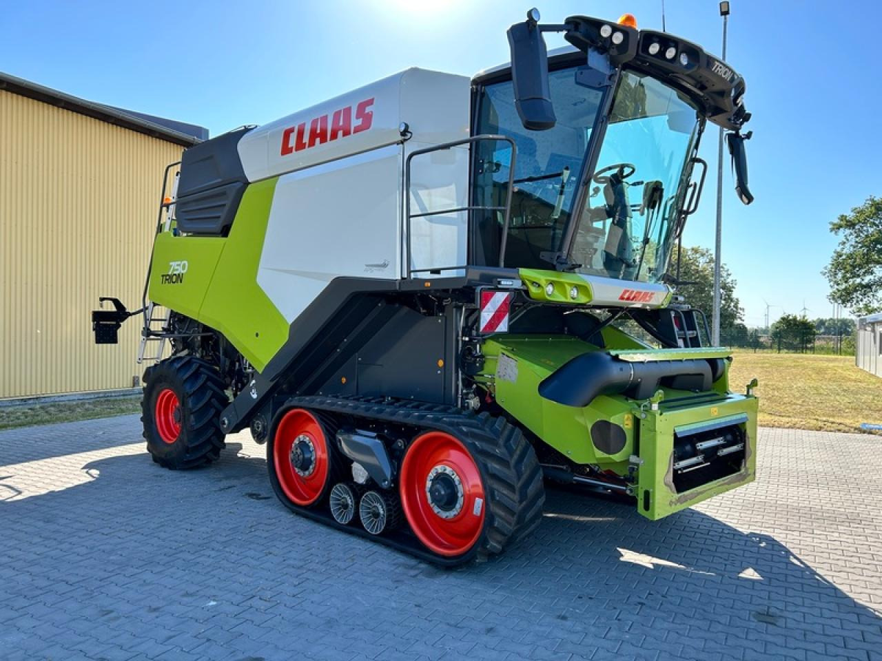 CLAAS TRION 750 TT APS HYBRID - Θεριζοαλωνιστική μηχανή: φωτογραφία 4 CLAAS TRION 750 TT APS HYBRID - Θεριζοαλωνιστική μηχανή: φωτογραφία 4
