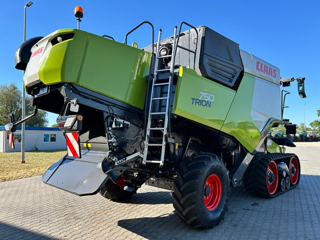 CLAAS TRION 750 TT APS HYBRID - Θεριζοαλωνιστική μηχανή: φωτογραφία 3 CLAAS TRION 750 TT APS HYBRID - Θεριζοαλωνιστική μηχανή: φωτογραφία 3
