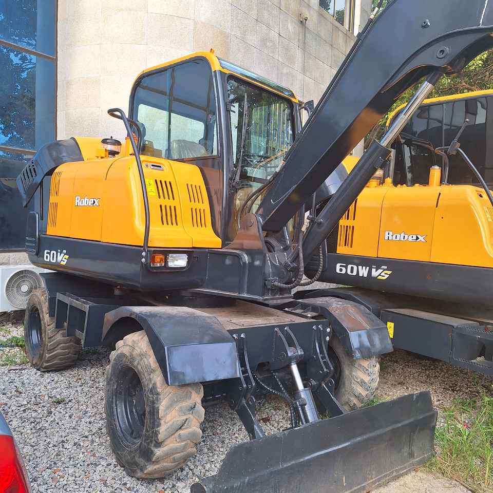 Hyundai 60vs  excavator - Τροχοφόρος εκσκαφέας: φωτογραφία 2 Hyundai 60vs  excavator - Τροχοφόρος εκσκαφέας: φωτογραφία 2