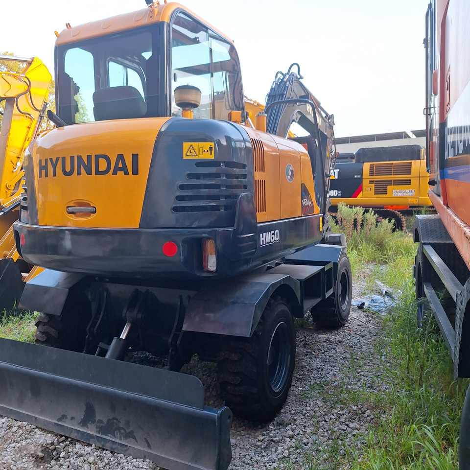 Hyundai HW60 excavator - Τροχοφόρος εκσκαφέας: φωτογραφία 1 Hyundai HW60 excavator - Τροχοφόρος εκσκαφέας: φωτογραφία 1