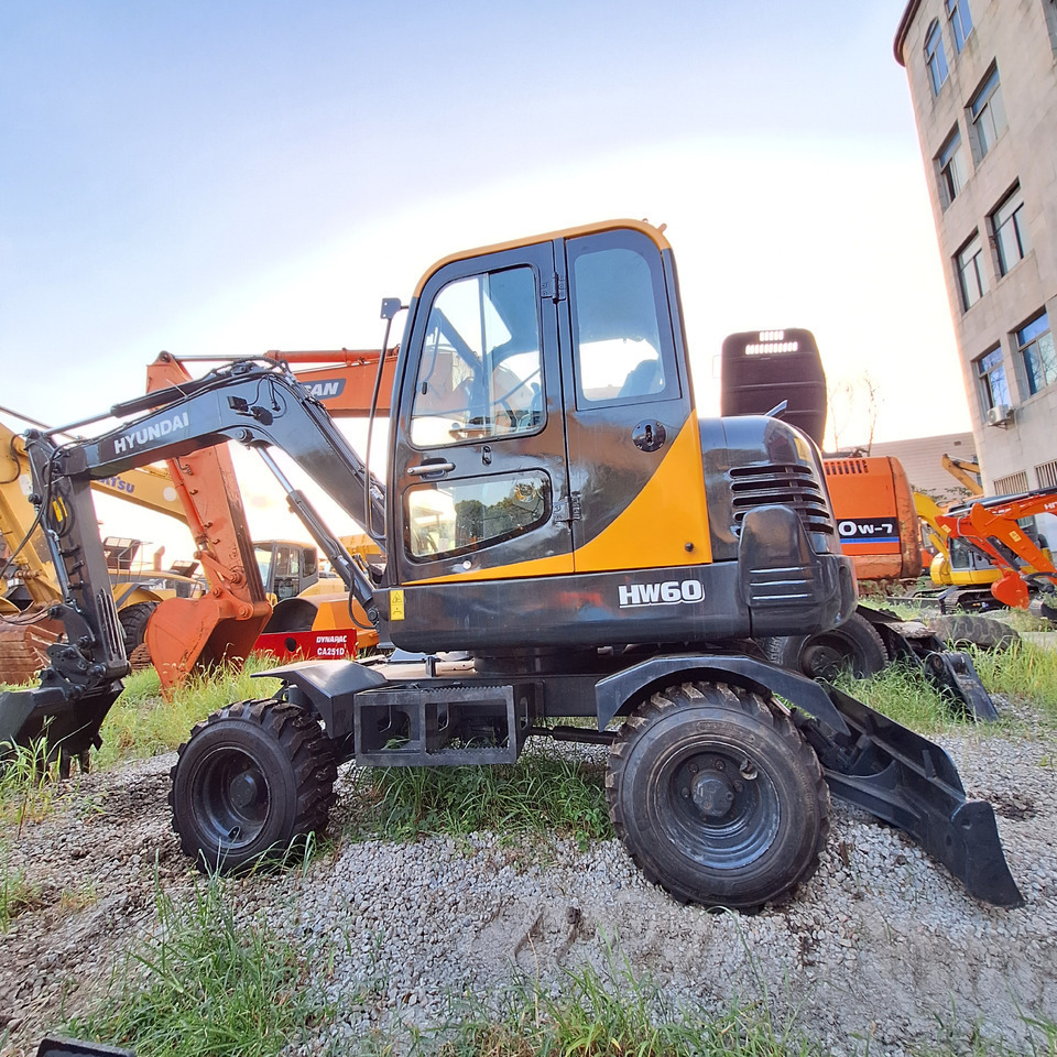 Hyundai HW60 excavator - Τροχοφόρος εκσκαφέας: φωτογραφία 2 Hyundai HW60 excavator - Τροχοφόρος εκσκαφέας: φωτογραφία 2