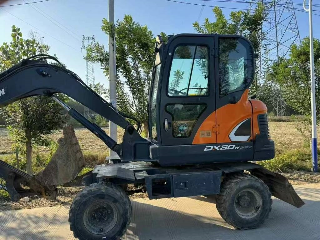 Doosan DX60W - Τροχοφόρος εκσκαφέας: φωτογραφία 1 Doosan DX60W - Τροχοφόρος εκσκαφέας: φωτογραφία 1