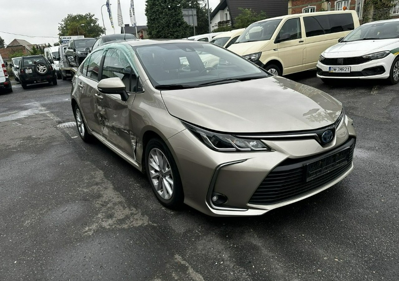 Toyota Corolla XII Corolla Sedan 1.8 Hybrid 98KM Comfort Salon PL 2022 - Αυτοκίνητο: φωτογραφία 1 Toyota Corolla XII Corolla Sedan 1.8 Hybrid 98KM Comfort Salon PL 2022 - Αυτοκίνητο: φωτογραφία 1