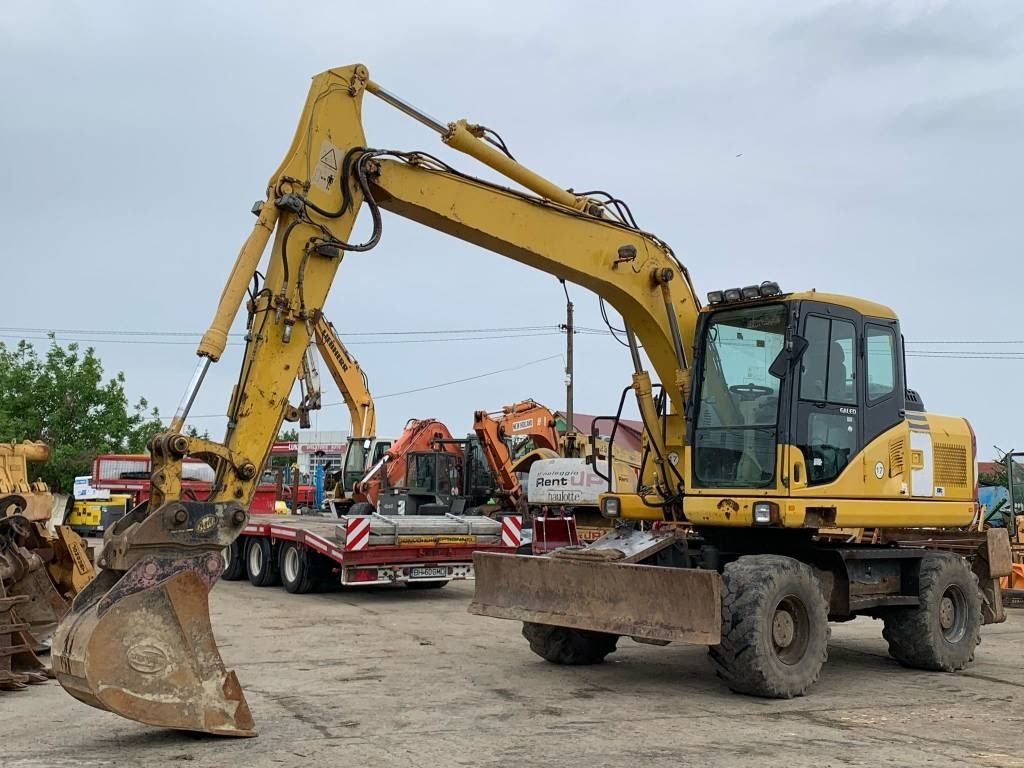 Komatsu PW 140-7 - Τροχοφόρος εκσκαφέας: φωτογραφία 1 Komatsu PW 140-7 - Τροχοφόρος εκσκαφέας: φωτογραφία 1