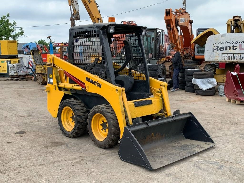 Komatsu SK 510 - Φορτωτής πλάγιας ολίσθησης: φωτογραφία 1 Komatsu SK 510 - Φορτωτής πλάγιας ολίσθησης: φωτογραφία 1