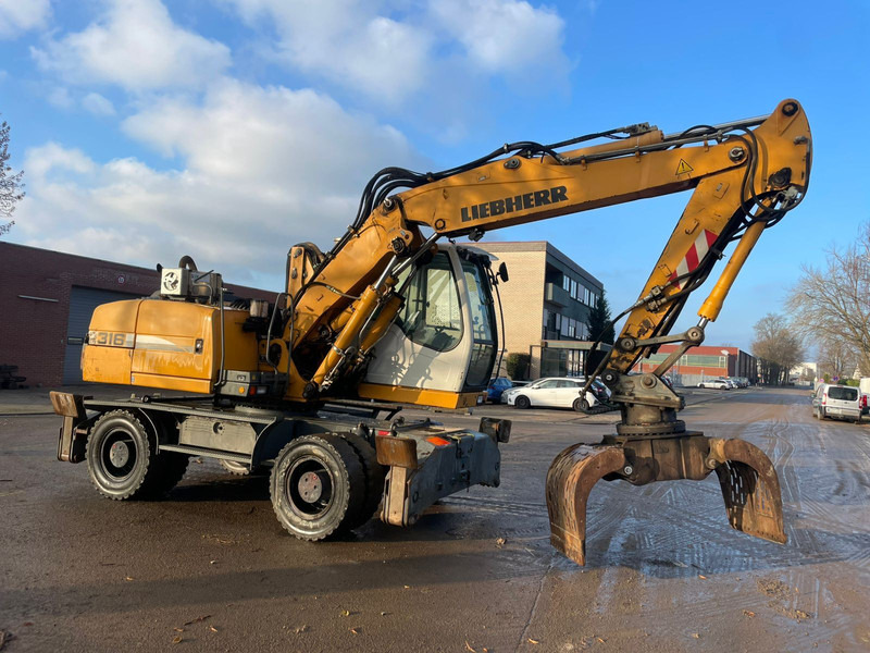 Liebherr A 316 - Τροχοφόρος εκσκαφέας: φωτογραφία 1 Liebherr A 316 - Τροχοφόρος εκσκαφέας: φωτογραφία 1