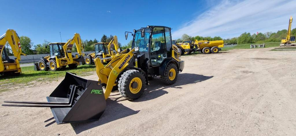 Komatsu WA 70 - Ελαστιχοφόρος φορτωτής: φωτογραφία 2 Komatsu WA 70 - Ελαστιχοφόρος φορτωτής: φωτογραφία 2
