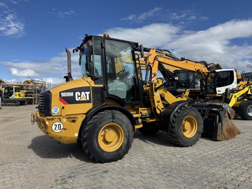 CAT 908M mit Klappschaufe und Palletengabeln - Ελαστιχοφόρος φορτωτής: φωτογραφία 4 CAT 908M mit Klappschaufe und Palletengabeln - Ελαστιχοφόρος φορτωτής: φωτογραφία 4