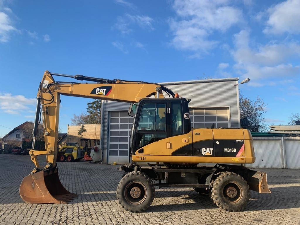 CAT M 316 D - Τροχοφόρος εκσκαφέας: φωτογραφία 2 CAT M 316 D - Τροχοφόρος εκσκαφέας: φωτογραφία 2