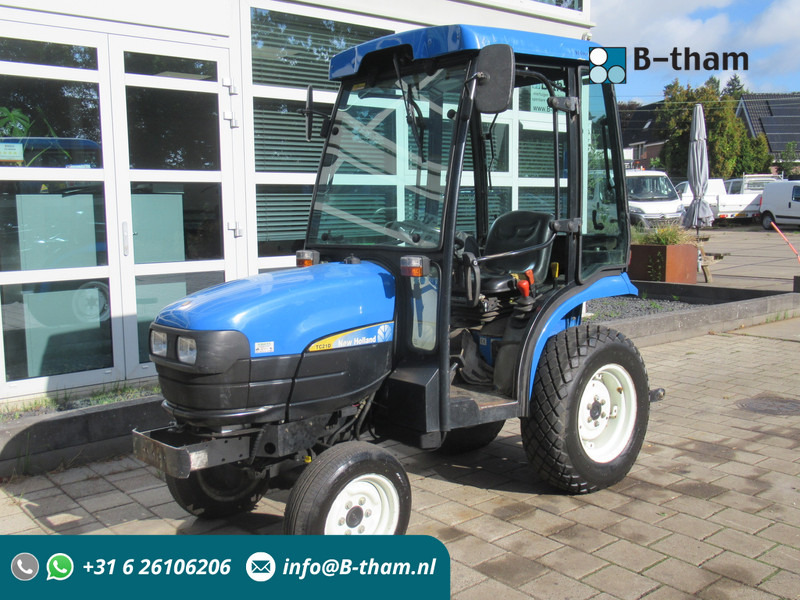 New Holland TC21D 4WD 4x4 Cabine Verwarming - Τρακτέρ: φωτογραφία 1 New Holland TC21D 4WD 4x4 Cabine Verwarming - Τρακτέρ: φωτογραφία 1