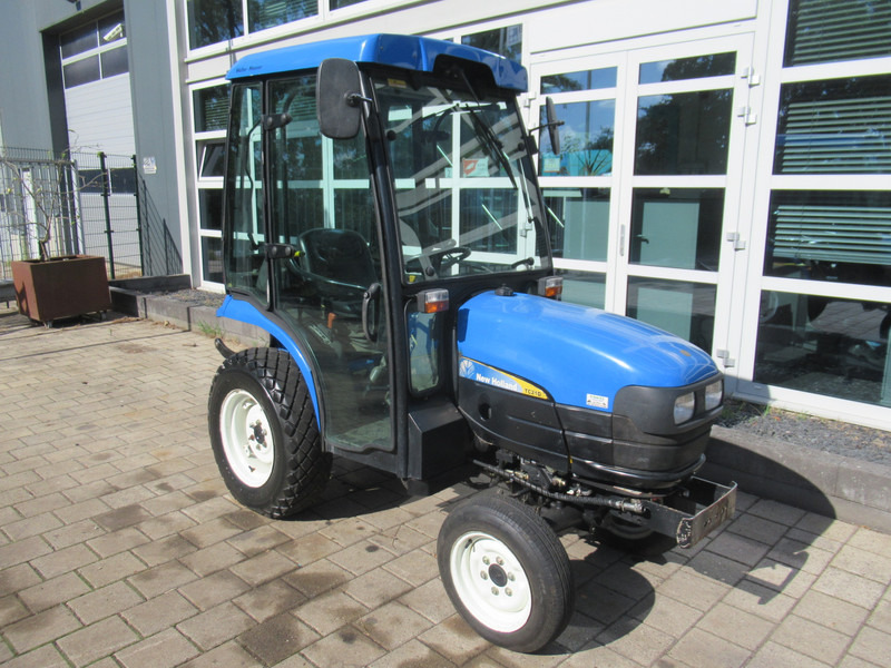 New Holland TC21D 4WD 4x4 Cabine Verwarming - Τρακτέρ: φωτογραφία 5 New Holland TC21D 4WD 4x4 Cabine Verwarming - Τρακτέρ: φωτογραφία 5