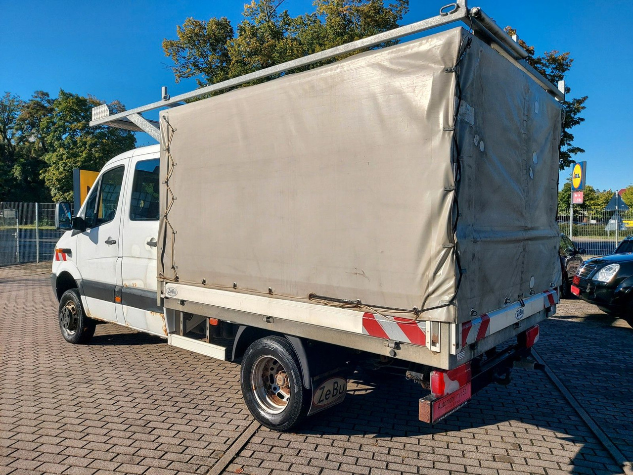 Mercedes-Benz Sprinter II Pritsche DoKa 516 4X4 Plane 6 Sitze - Επαγγελματικό αυτοκίνητο με μουσαμά, Διπλοκάμπινο ελαφρύ επαγγελματικό: φωτογραφία 4 Mercedes-Benz Sprinter II Pritsche DoKa 516 4X4 Plane 6 Sitze - Επαγγελματικό αυτοκίνητο με μουσαμά, Διπλοκάμπινο ελαφρύ επαγγελματικό: φωτογραφία 4