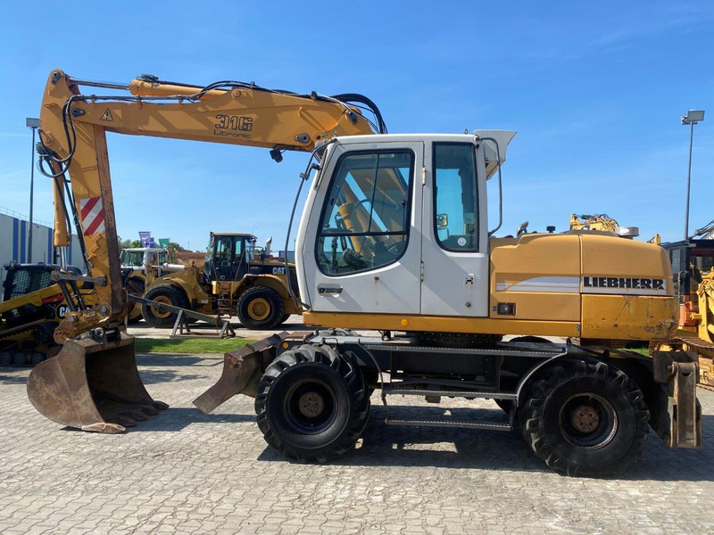 Liebherr A316 Litronic NVT - Τροχοφόρος εκσκαφέας: φωτογραφία 2 Liebherr A316 Litronic NVT - Τροχοφόρος εκσκαφέας: φωτογραφία 2