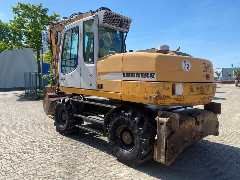 Liebherr A316 Litronic - Τροχοφόρος εκσκαφέας: φωτογραφία 1 Liebherr A316 Litronic - Τροχοφόρος εκσκαφέας: φωτογραφία 1