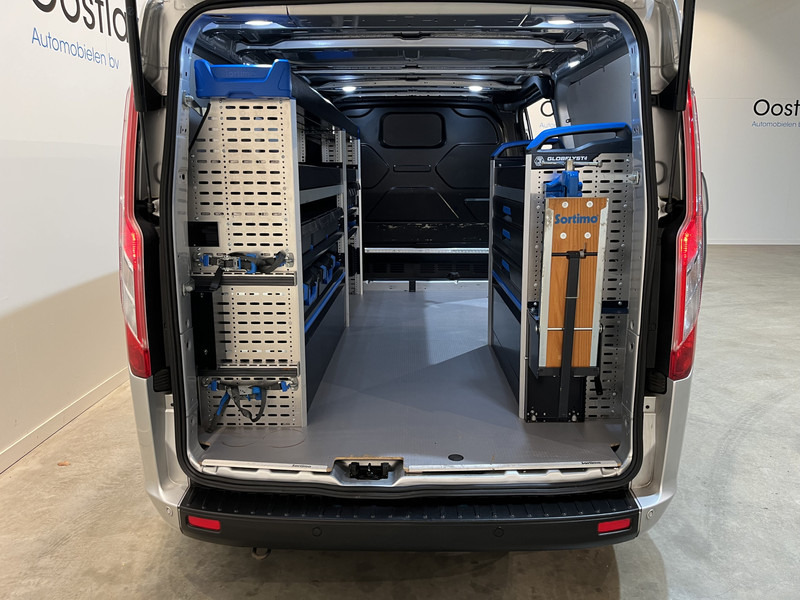 Ford Transit Custom 300 2.0 TDCI L2H1 Trend 130 PK Servicebus / Sortimo Inrichting / Euro 6 / Airco / Cruise Control / Klep / PDC / 3-Zits - Μικρό βαν: φωτογραφία 4 Ford Transit Custom 300 2.0 TDCI L2H1 Trend 130 PK Servicebus / Sortimo Inrichting / Euro 6 / Airco / Cruise Control / Klep / PDC / 3-Zits - Μικρό βαν: φωτογραφία 4