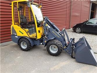 Eurotrac W11 med lang arm, førerhus, skovl og gafler - Σπαστός φορτωτής: φωτογραφία 1 Eurotrac W11 med lang arm, førerhus, skovl og gafler - Σπαστός φορτωτής: φωτογραφία 1