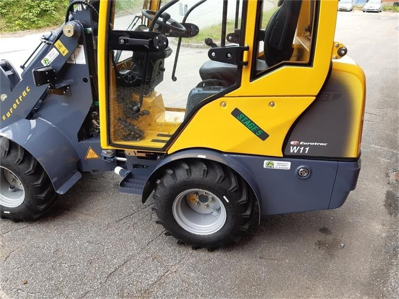 Eurotrac W11 med lang arm, førerhus, skovl og gafler - Σπαστός φορτωτής: φωτογραφία 5 Eurotrac W11 med lang arm, førerhus, skovl og gafler - Σπαστός φορτωτής: φωτογραφία 5