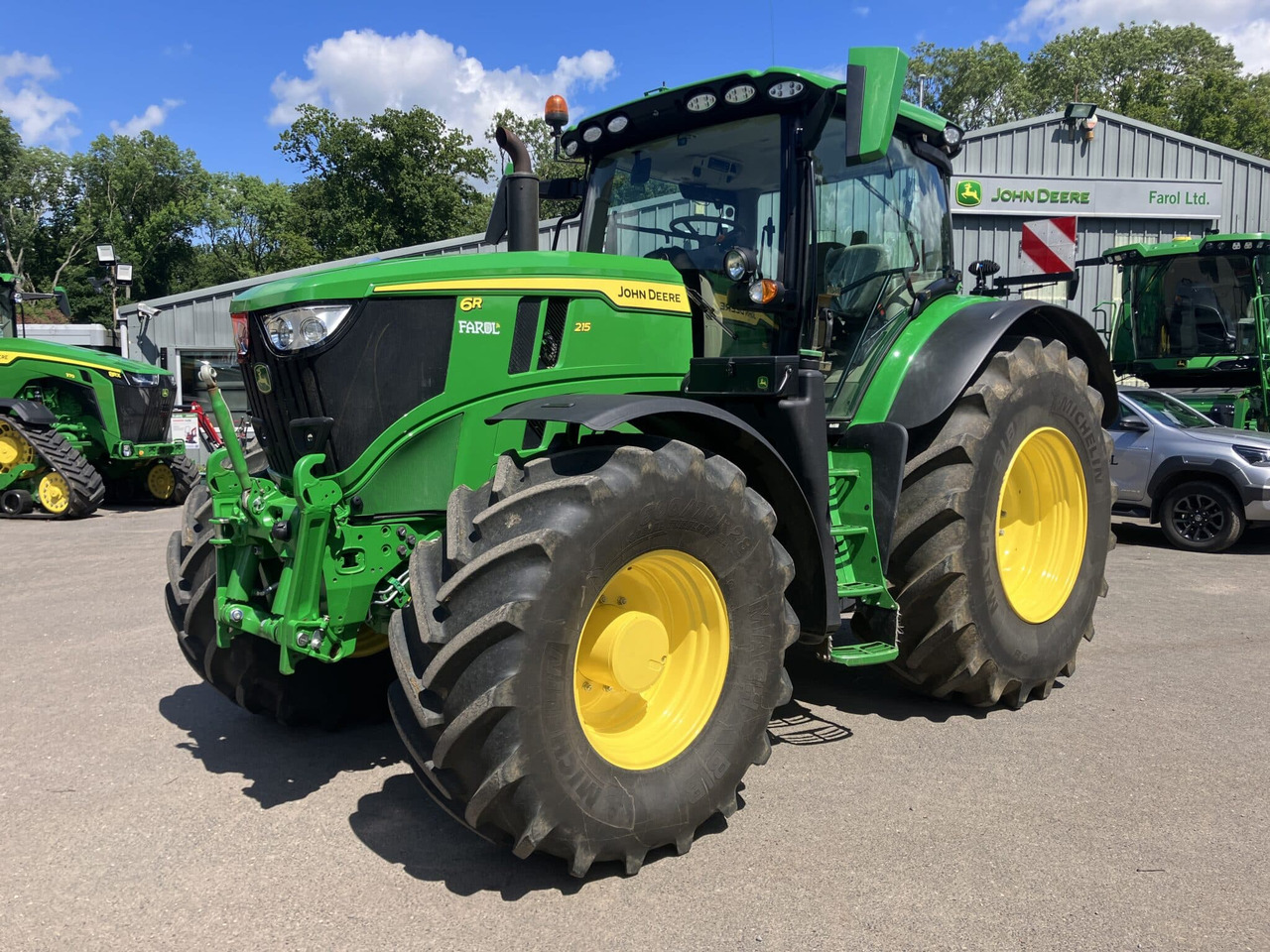 John Deere 6R 215 - Τρακτέρ: φωτογραφία 1 John Deere 6R 215 - Τρακτέρ: φωτογραφία 1