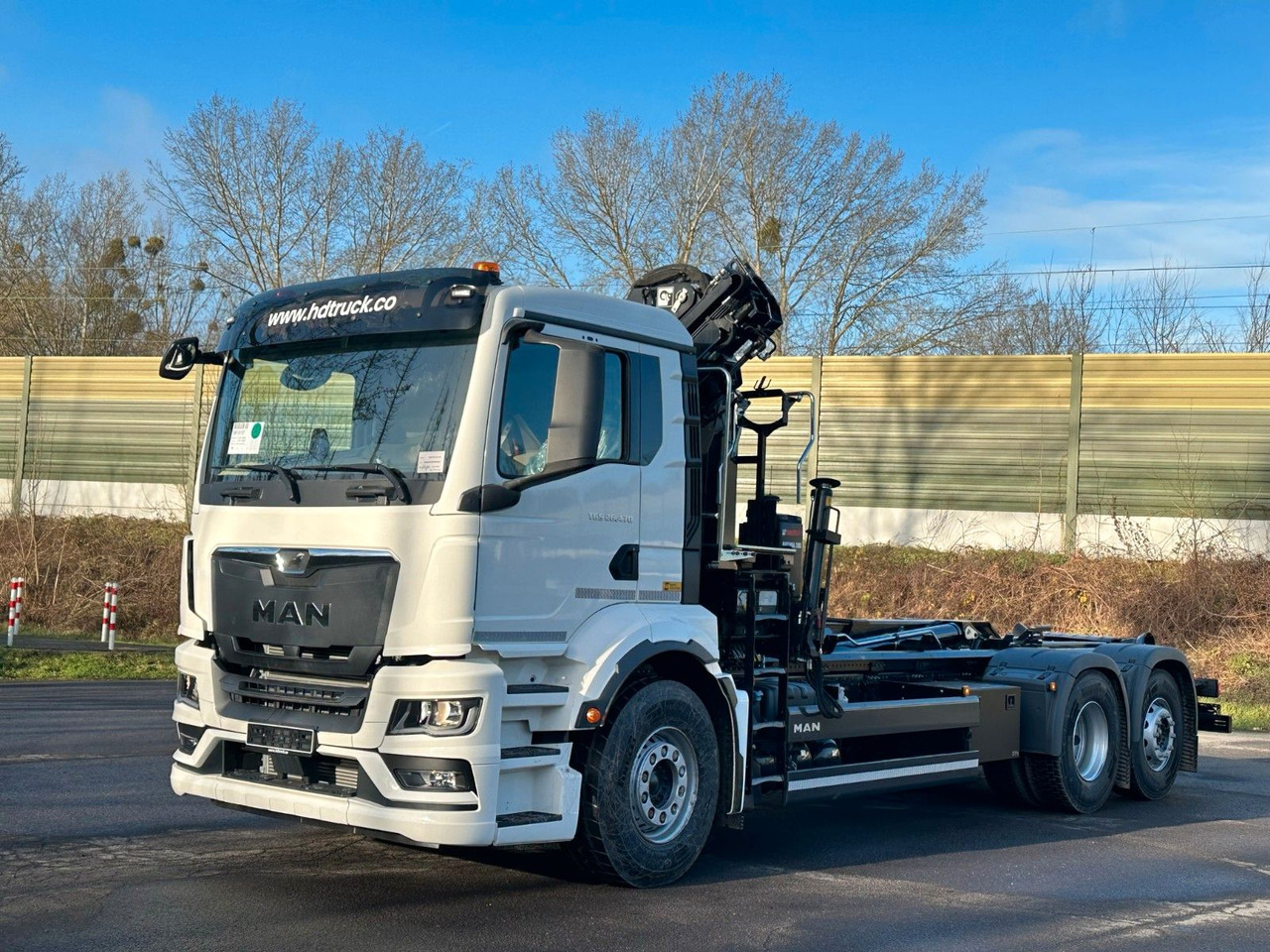 MAN TGS 26.470 6x2 Abrollkipper + Kran Hiab 138-3 - Φορτηγό φόρτωσης γάντζου, Φορτηγό με γερανό: φωτογραφία 2 MAN TGS 26.470 6x2 Abrollkipper + Kran Hiab 138-3 - Φορτηγό φόρτωσης γάντζου, Φορτηγό με γερανό: φωτογραφία 2