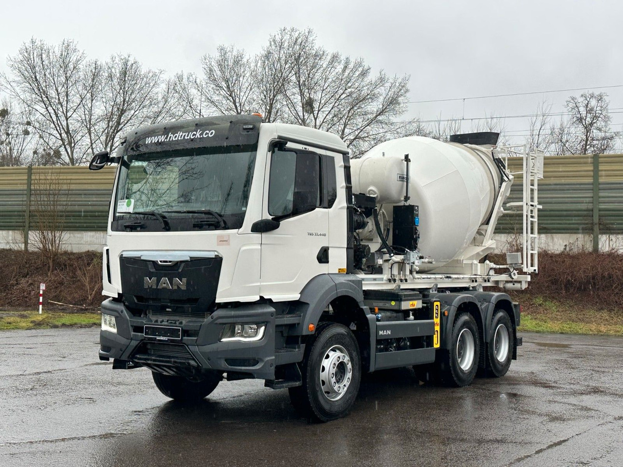 MAN TGS 33.440 6x4 Euro6e Abroller + Fahrmischer - Φορτηγό φόρτωσης γάντζου, Φορτηγό με γερανό: φωτογραφία 2 MAN TGS 33.440 6x4 Euro6e Abroller + Fahrmischer - Φορτηγό φόρτωσης γάντζου, Φορτηγό με γερανό: φωτογραφία 2