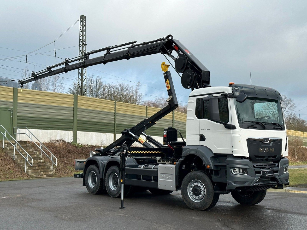 MAN TGS 33.440 6x6 BB Abrollkipper+Kran Hiab 228-6 - Φορτηγό φόρτωσης γάντζου, Φορτηγό με γερανό: φωτογραφία 3 MAN TGS 33.440 6x6 BB Abrollkipper+Kran Hiab 228-6 - Φορτηγό φόρτωσης γάντζου, Φορτηγό με γερανό: φωτογραφία 3