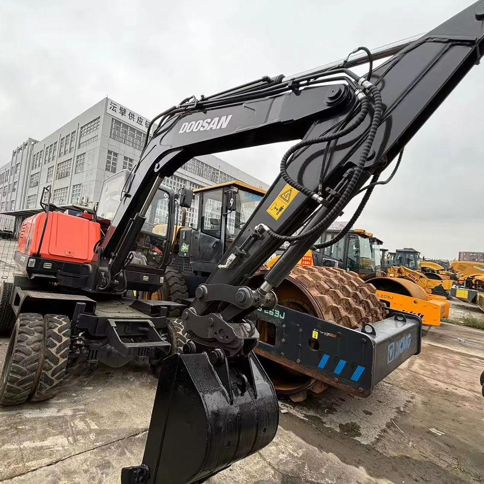 Hot Sale Used Doosan Dx75 Small 7.5t Wheel Excavator South Korea DX75 Mini Excavator for Sale Good Condition - Τροχοφόρος εκσκαφέας: φωτογραφία 1 Hot Sale Used Doosan Dx75 Small 7.5t Wheel Excavator South Korea DX75 Mini Excavator for Sale Good Condition - Τροχοφόρος εκσκαφέας: φωτογραφία 1