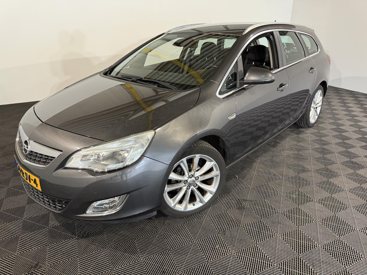 Opel Astra Sports Tourer 1.4 Turbo Cosmo 64-RJV-4 - Αυτοκίνητο: φωτογραφία 1 Opel Astra Sports Tourer 1.4 Turbo Cosmo 64-RJV-4 - Αυτοκίνητο: φωτογραφία 1