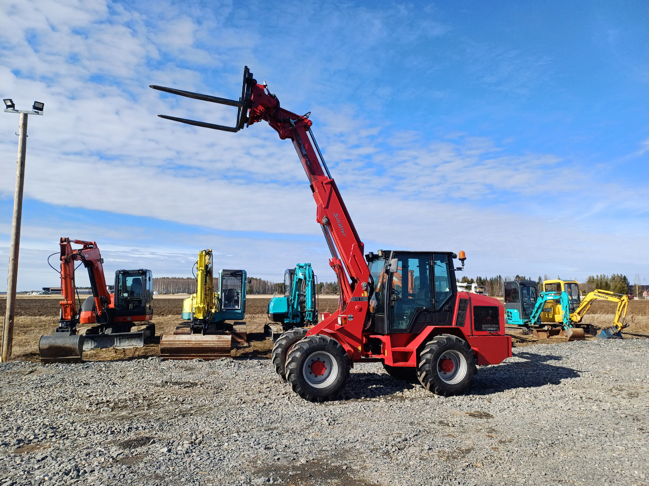 Ελαστιχοφόρος φορτωτής Schäffer 870TD Teleskooppi puomilla: φωτογραφία 10 Ελαστιχοφόρος φορτωτής Schäffer 870TD Teleskooppi puomilla: φωτογραφία 10